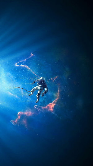 Astronaut Floating in Deep Space with Blue and Pink Nebula Background HD phone wallpaper