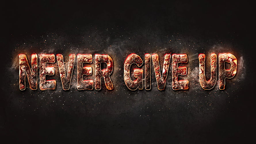 Never Give Up Motivational Typography with Fiery Metallic Texture on Dark Background HD wallpaper