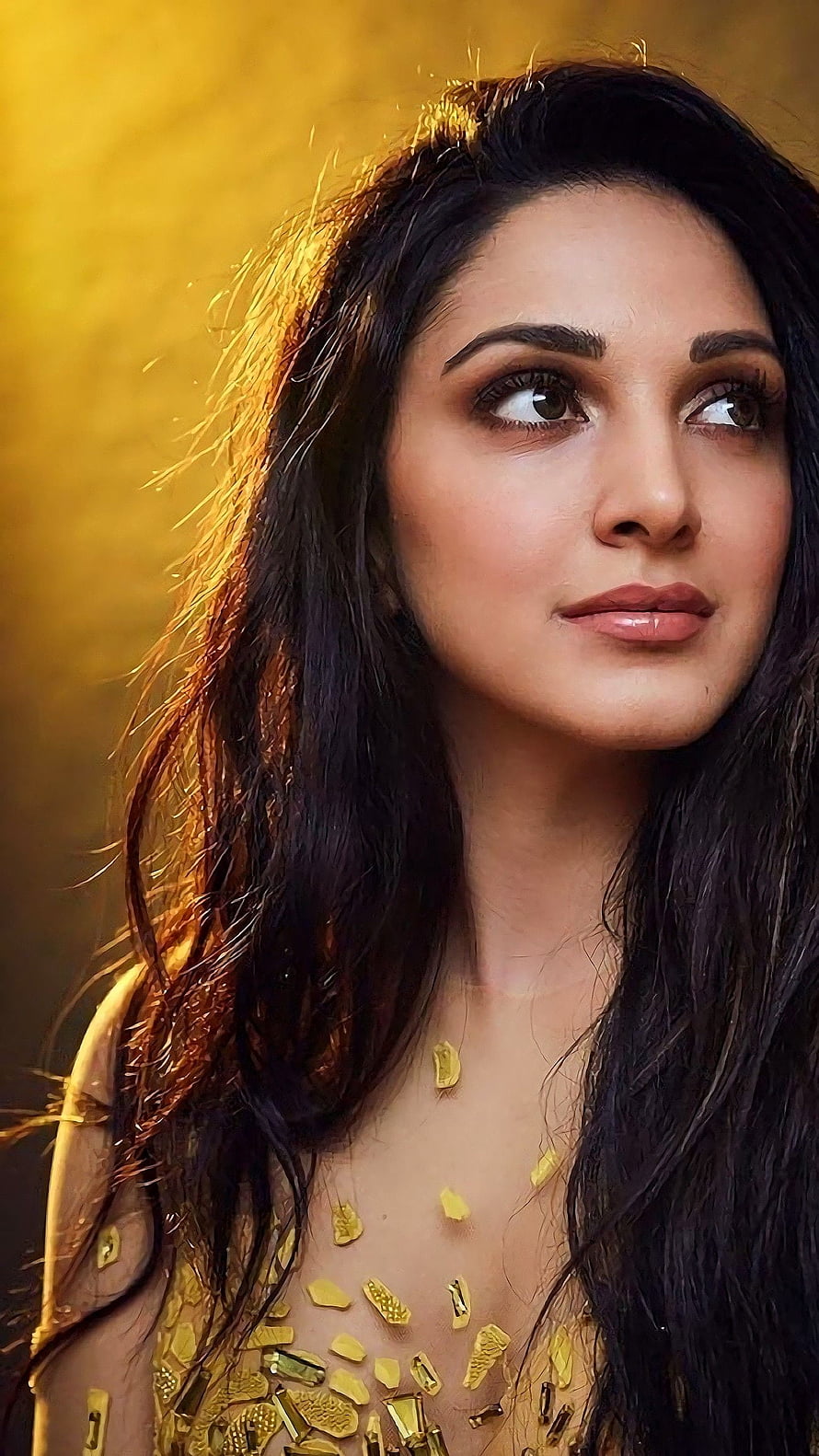 Kiara Advani in Golden Embellished Attire with Warm Backlit Hair HD phone wallpaper
