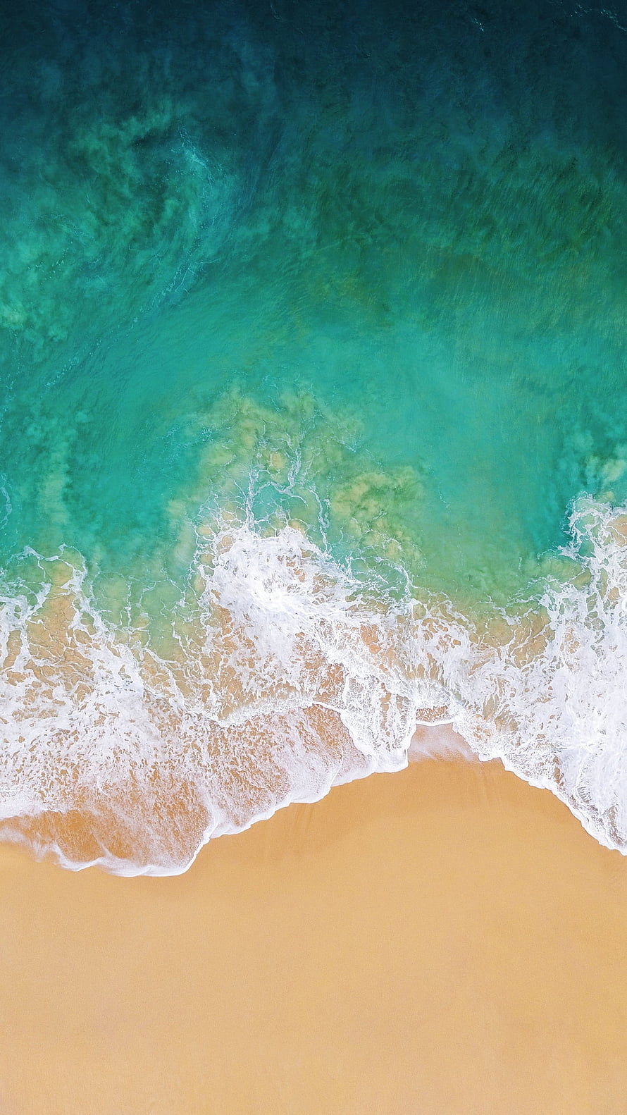Aerial View of Turquoise Ocean Waves Crashing on Golden Sandy Beach HD phone wallpaper
