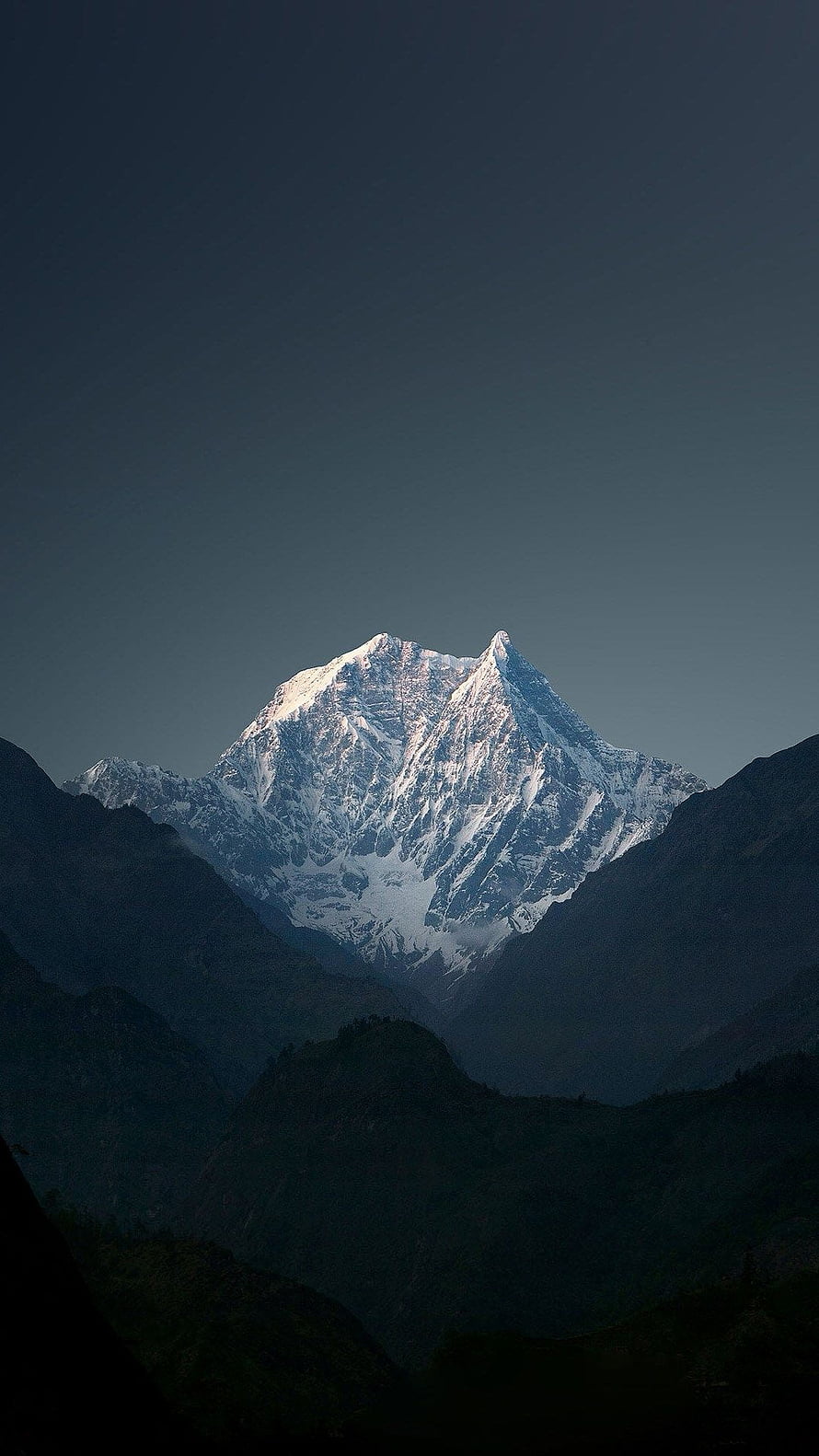 Mount Kailash Snow-Capped Peak Rising Above Dark Rugged Valleys at Dawn HD phone wallpaper