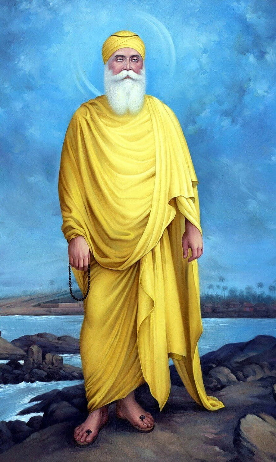 Guru Nanak Dev Ji in Yellow Robes Standing on Rocks by the Water HD phone wallpaper