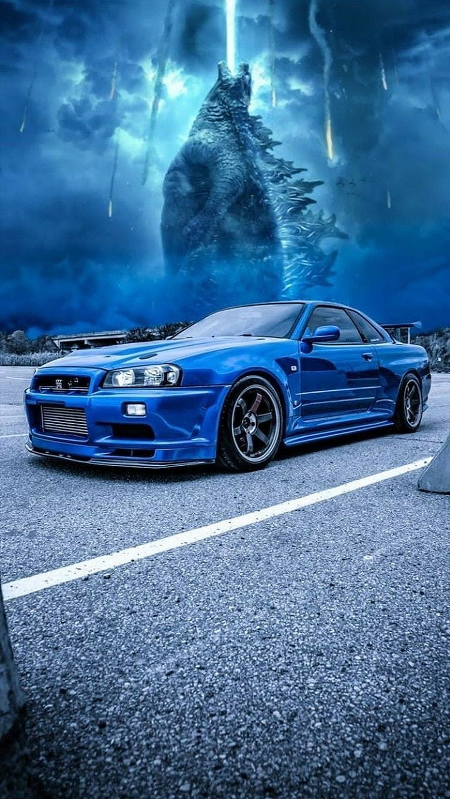 Blue Nissan Skyline GT-R R34 with Godzilla Roaring in Background HD phone wallpaper