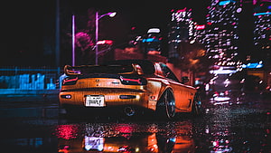 Mazda RX-7 Rear View on Wet City Street at Night with Neon Reflections HD wallpaper
