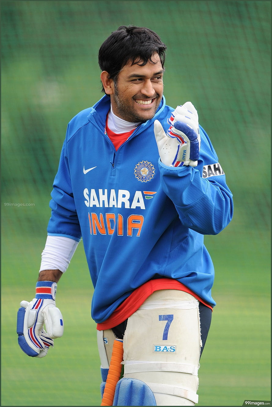 MS Dhoni Smiling in Blue India Cricket Training Gear with Bat and Pads HD phone wallpaper