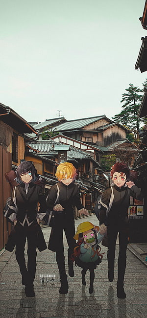 Demon Slayer Characters Walking Through a Traditional Japanese Street HD phone wallpaper