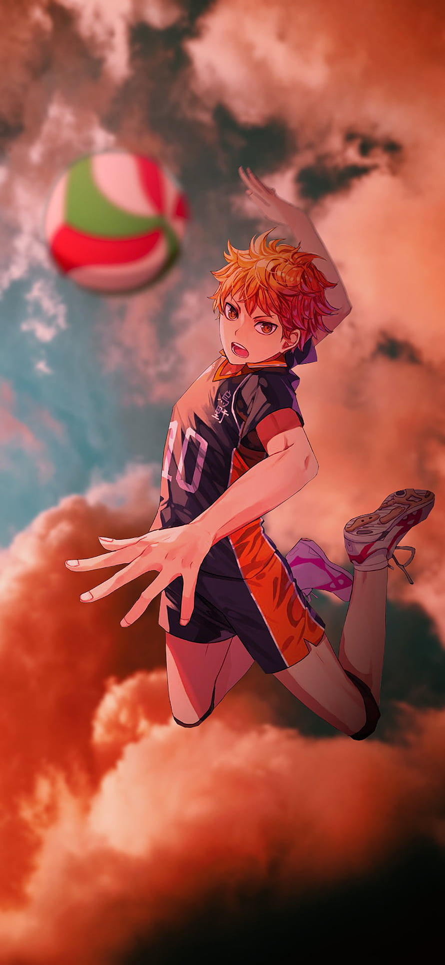 Haikyu!! Anime Character Leaping to Spike Volleyball Against Dramatic Sunset Sky HD phone wallpaper