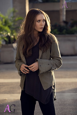 Elizabeth Olsen as Wanda Maximoff in a casual olive jacket and dark top HD phone wallpaper