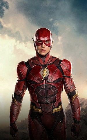 The Flash in Red Suit Standing Against Dramatic Cloudy Sky HD phone wallpaper