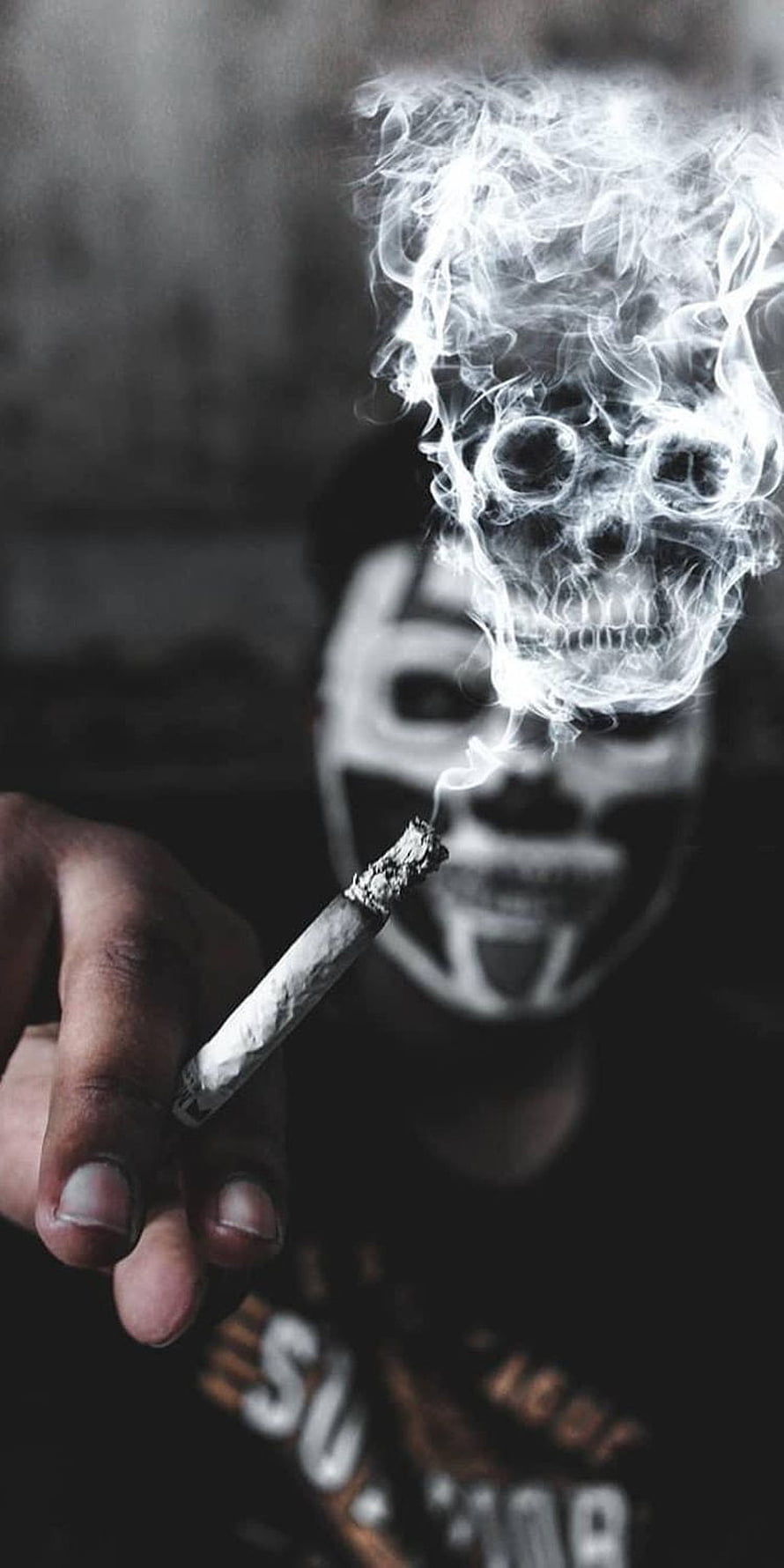 Joker Face Paint With Cigarette Smoke Forming A Skull In Black And White HD phone wallpaper