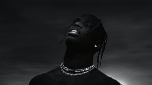 Travis Scott Black and White Portrait with Diamond Chain and Braids HD wallpaper