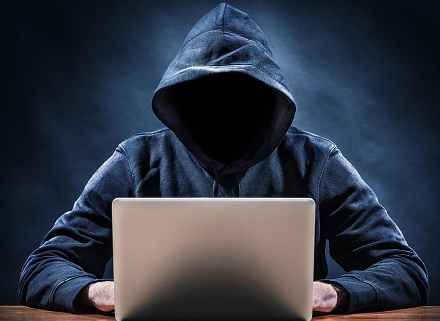 Anonymous Hacker in Hoodie Using Laptop for Cybersecurity Concept HD wallpaper