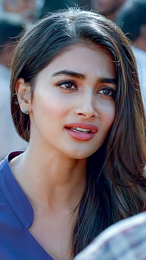 Pooja Hegde Close-Up Portrait in Blue Top with Natural Makeup and Expressive Gaze HD phone wallpaper