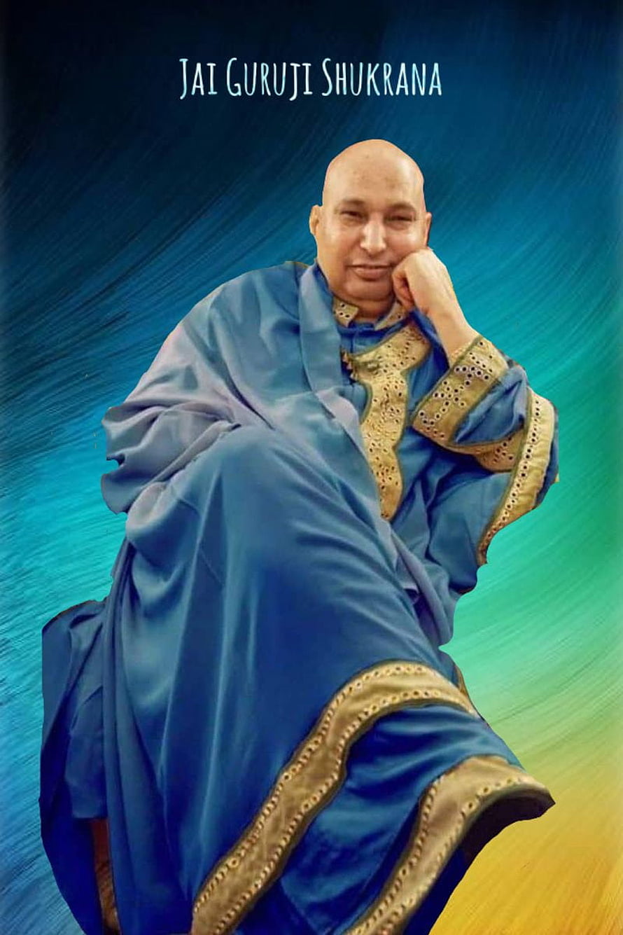 Portrait of Gururaj Prasad in Blue Robes with Gold Trim and Text Overlay HD phone wallpaper