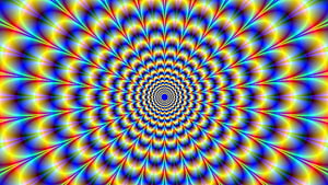 Vibrant Kaleidoscopic Spiral Pattern With Radiating Rainbow Colors And Hypnotic Geometric Design HD wallpaper
