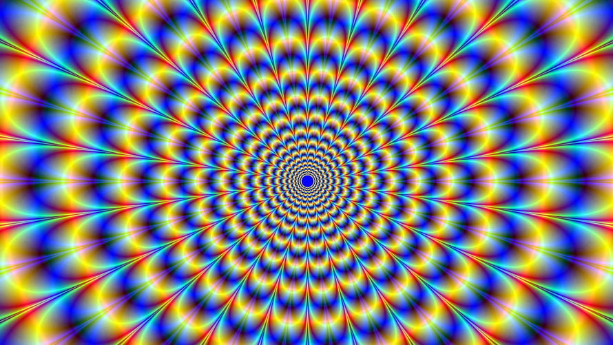 Vibrant Kaleidoscopic Spiral Pattern With Radiating Rainbow Colors And Hypnotic Geometric Design HD wallpaper