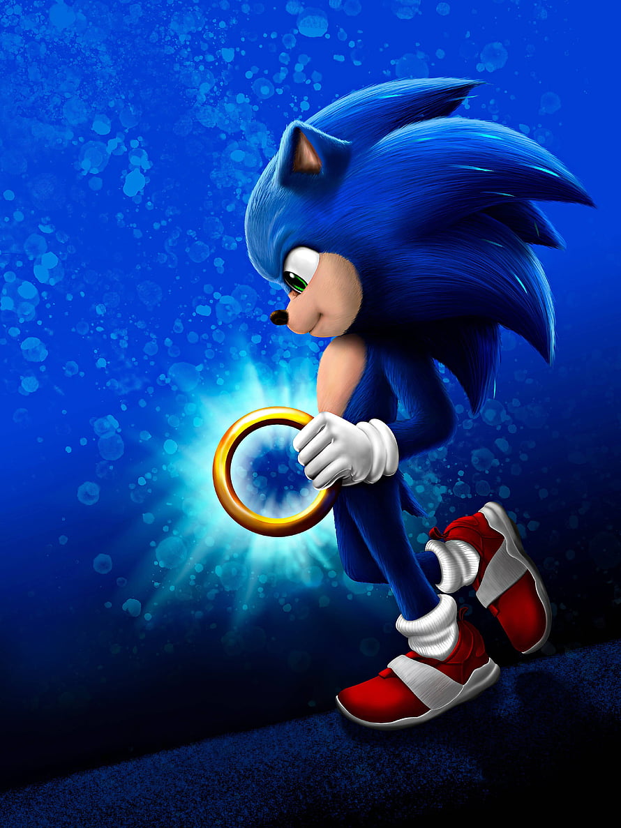 Sonic the Hedgehog holding a glowing golden ring against a deep blue underwater background HD phone wallpaper