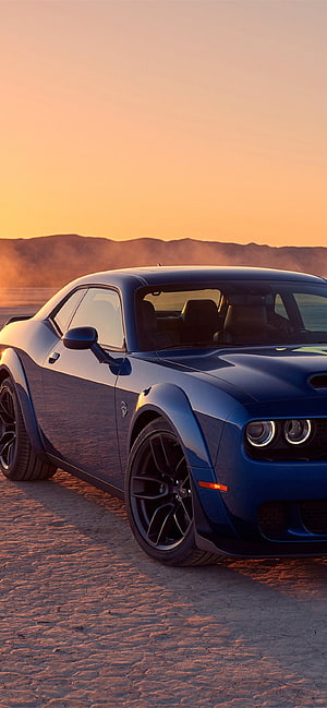 Blue Dodge Challenger SRT Hellcat Coupe Parked on Desert Terrain at Sunset HD phone wallpaper