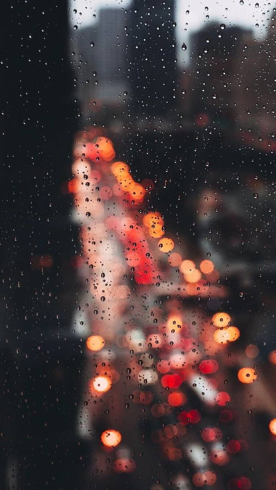 Raindrops on Window with Blurred City Lights Bokeh Background HD phone wallpaper