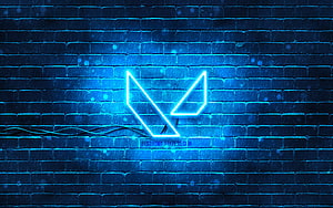 Glowing Blue Valorant Neon Sign Mounted on a Dark Brick Wall HD wallpaper