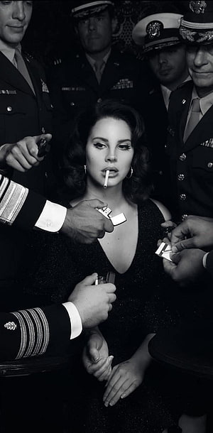 Lana Del Rey Surrounded by Military Men in Black and White Portrait HD phone wallpaper
