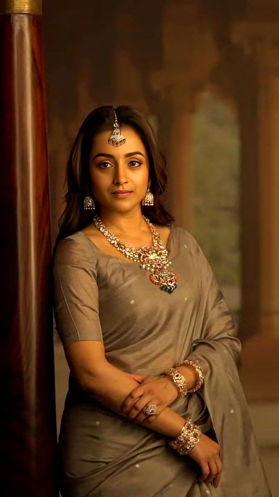 Trisha in a Grey Saree with Traditional Indian Jewelry and Maang Tikka HD phone wallpaper