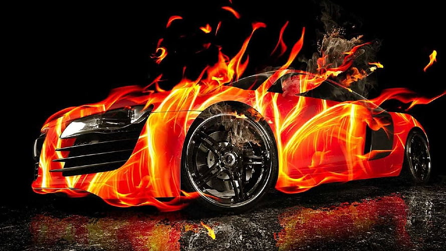Audi R8 Sports Car Wrapped in Intense Flames and Fire on Dark Background HD wallpaper