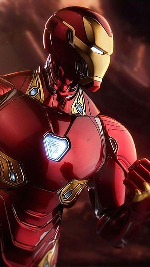 Iron Man Mark 85 Armor Close-Up with Glowing Arc Reactor and Gold Accents, Marvel fondos de pantalla para teléfono. Marvel , Iron man , Marvel , Thing Marvel HD phone wallpaper