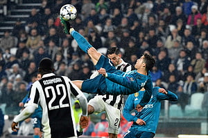 Cristiano Ronaldo Bicycle Kick Action Shot in Real Madrid Blue Kit HD wallpaper