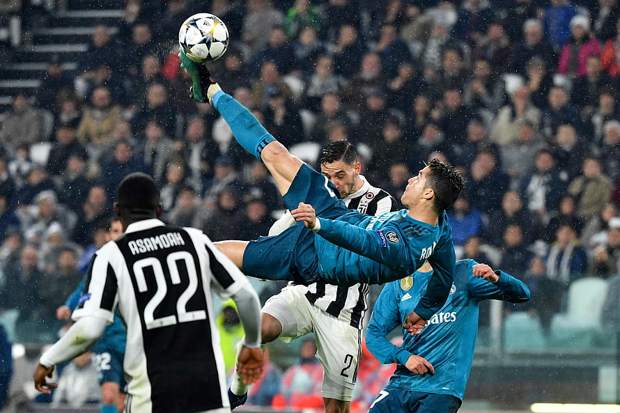 Cristiano Ronaldo Bicycle Kick Action Shot in Real Madrid Blue Kit HD wallpaper