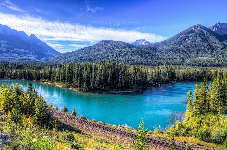Turquoise Bow River Winding Through Pine Forest Near Banff National Park HD wallpaper