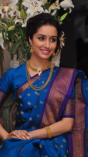 Shraddha Kapoor in a stunning blue silk saree with gold jewelry HD phone wallpaper