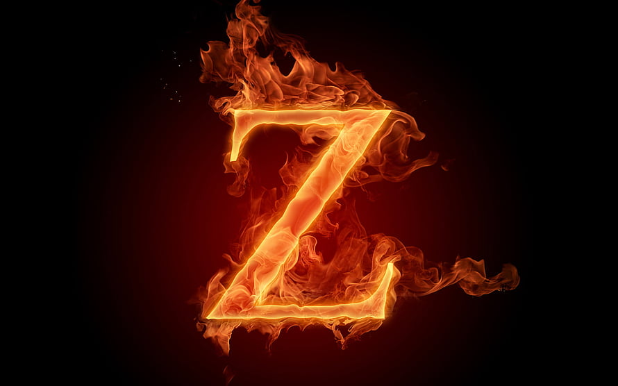 Blazing Letter Z Rendered in Vivid Orange Flames Against a Dark Background HD wallpaper