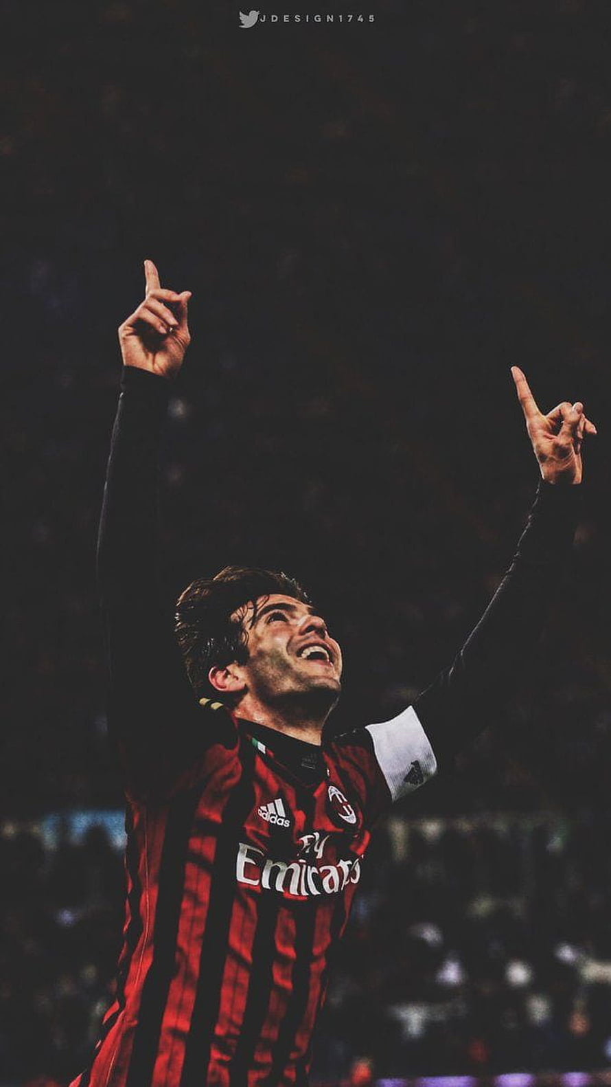 Ricardo Kaká in AC Milan kit celebrating with arms raised under stadium lights HD phone wallpaper
