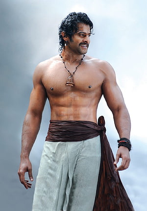 Prabhas as Baahubali in Traditional Attire with Wet Hair and Muscular Physique HD phone wallpaper