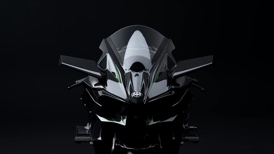 Front View of Sleek Black and White Sport Motorcycle with Aggressive Aerodynamic Fairing HD wallpaper