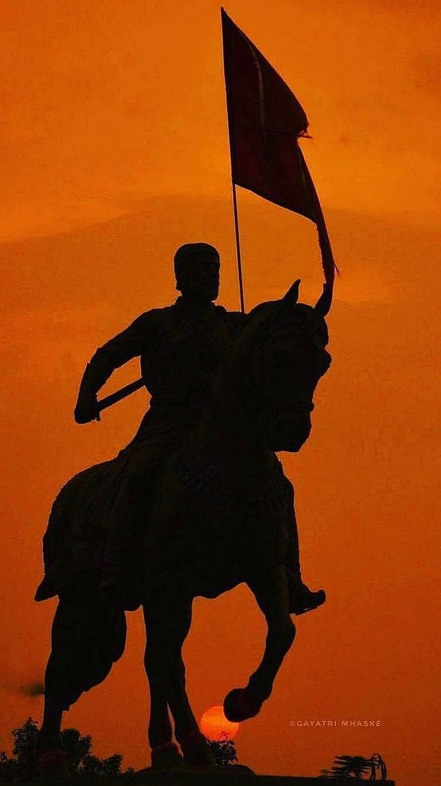 Shivaji Maharaj Equestrian Statue Silhouette Against Vibrant Orange Sunset Sky HD phone wallpaper