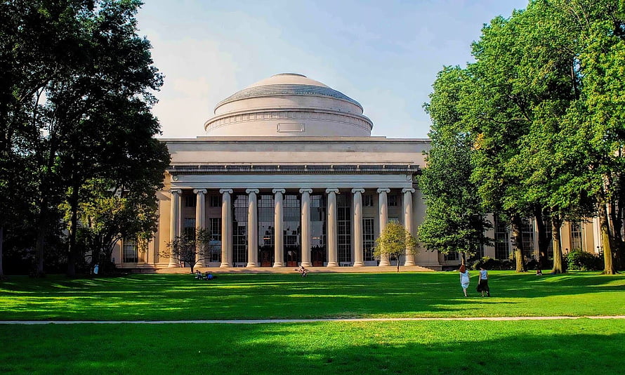 The Rotunda at the University of Virginia with green lawn and trees HD wallpaper