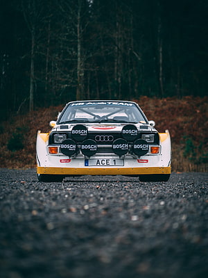Classic Audi Quattro Rally Car with Bosch Lights on Forest Road HD phone wallpaper