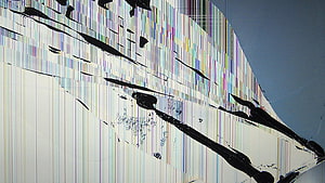 Abstract Glitch Art with Vertical Color Stripes and Black Ink Splatters on White Background HD wallpaper