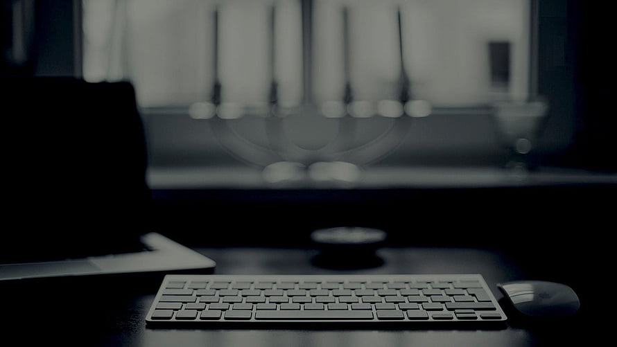 Minimalist Dark Workspace Setup with Keyboard and Mouse HD wallpaper