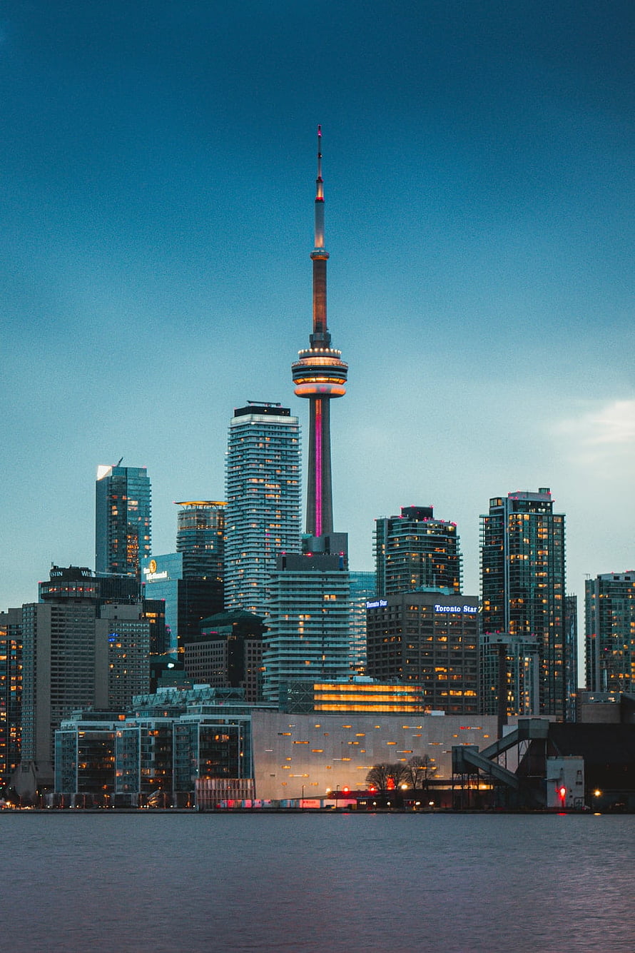CN Tower and Toronto Skyline at Dusk Viewed from the Waterfront HD phone wallpaper