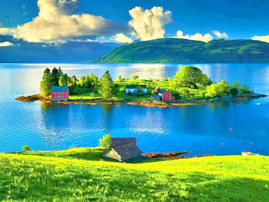 Scenic View of a Small Island with Red Cottages in a Blue Fjord HD wallpaper