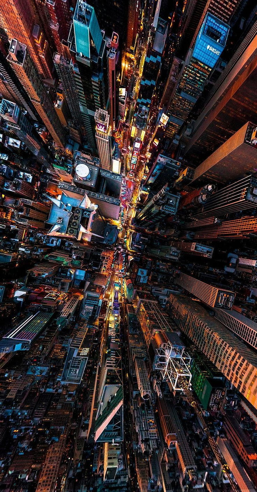 Aerial View of New York City Skyline at Night with Illuminated Skyscrapers HD phone wallpaper