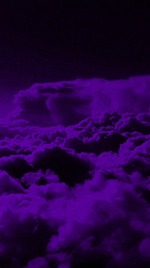 Dark Purple Storm Clouds Under a Moody Violet Sky HD phone wallpaper