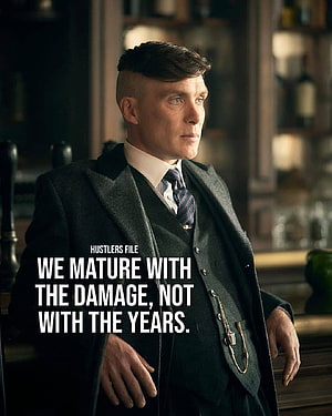 Thomas Shelby from Peaky Blinders in a dark suit with a serious expression HD phone wallpaper