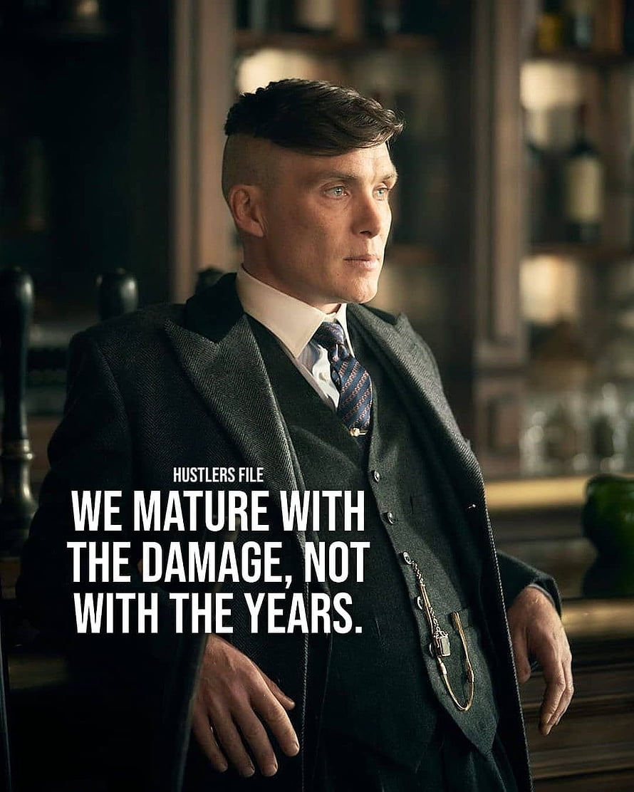 Thomas Shelby from Peaky Blinders in a dark suit with a serious expression HD phone wallpaper