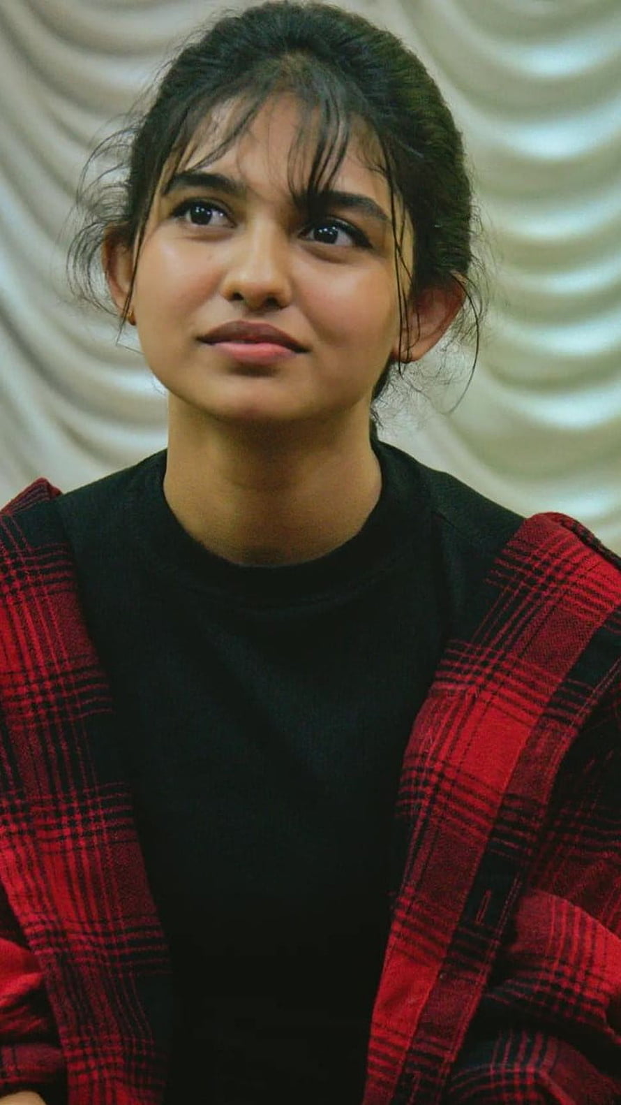 Mamitha Baiju Portrait in Red Plaid Jacket and Black Top HD phone wallpaper