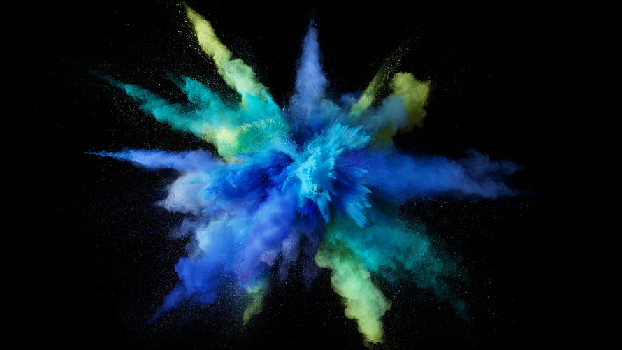 Vibrant Blue and Green Powder Explosion on Black Background HD wallpaper