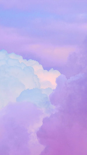 Soft Pastel Purple Sky with Fluffy White Clouds and Dreamy Lavender Hues HD phone wallpaper